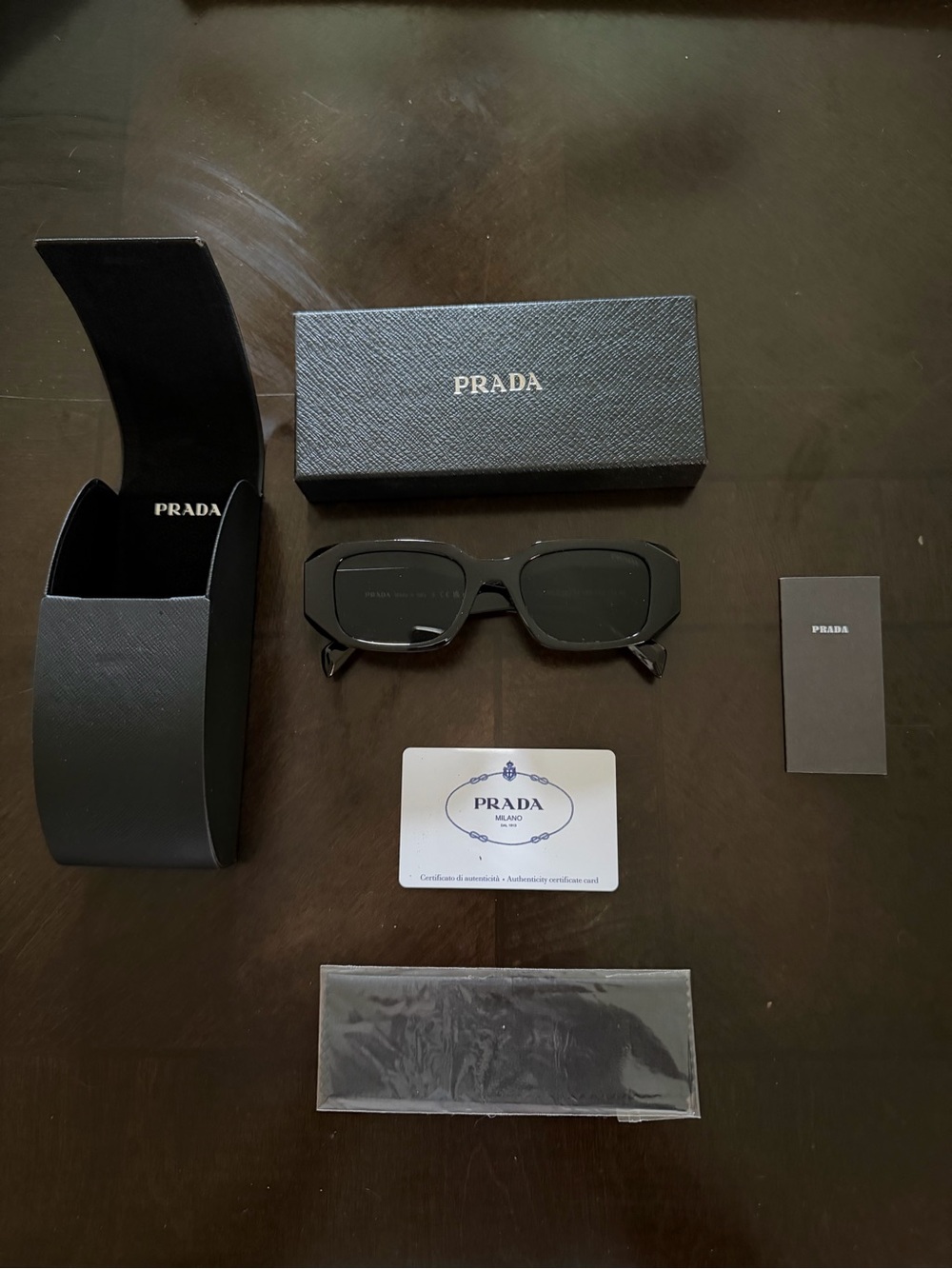 Prada Black Rectangular Sunglasses with Dark Lenses